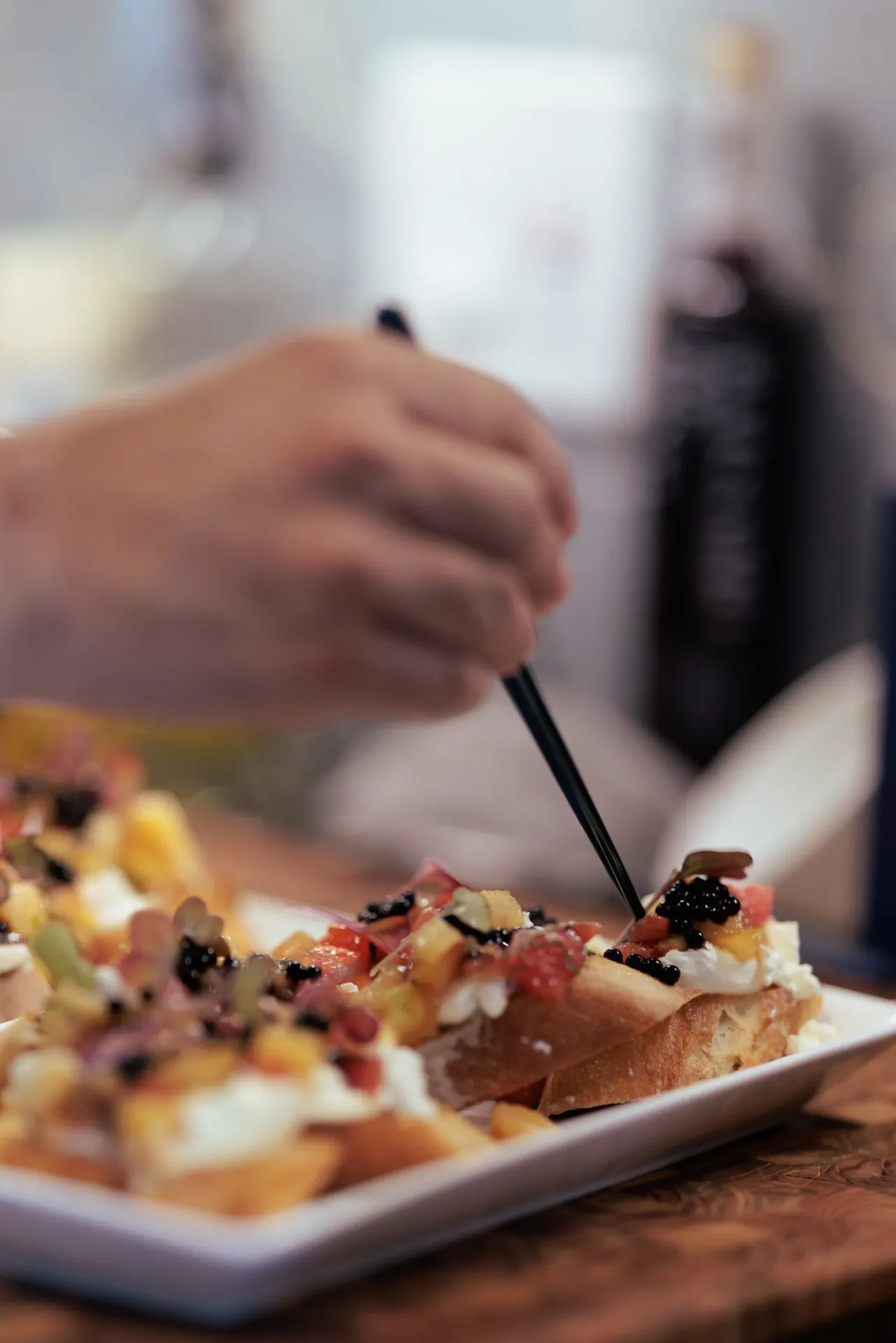 Bruschetta with caviar and fresh toppings